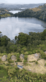 Top view of lake and cottages — Looking down over the crater lake and rooftops